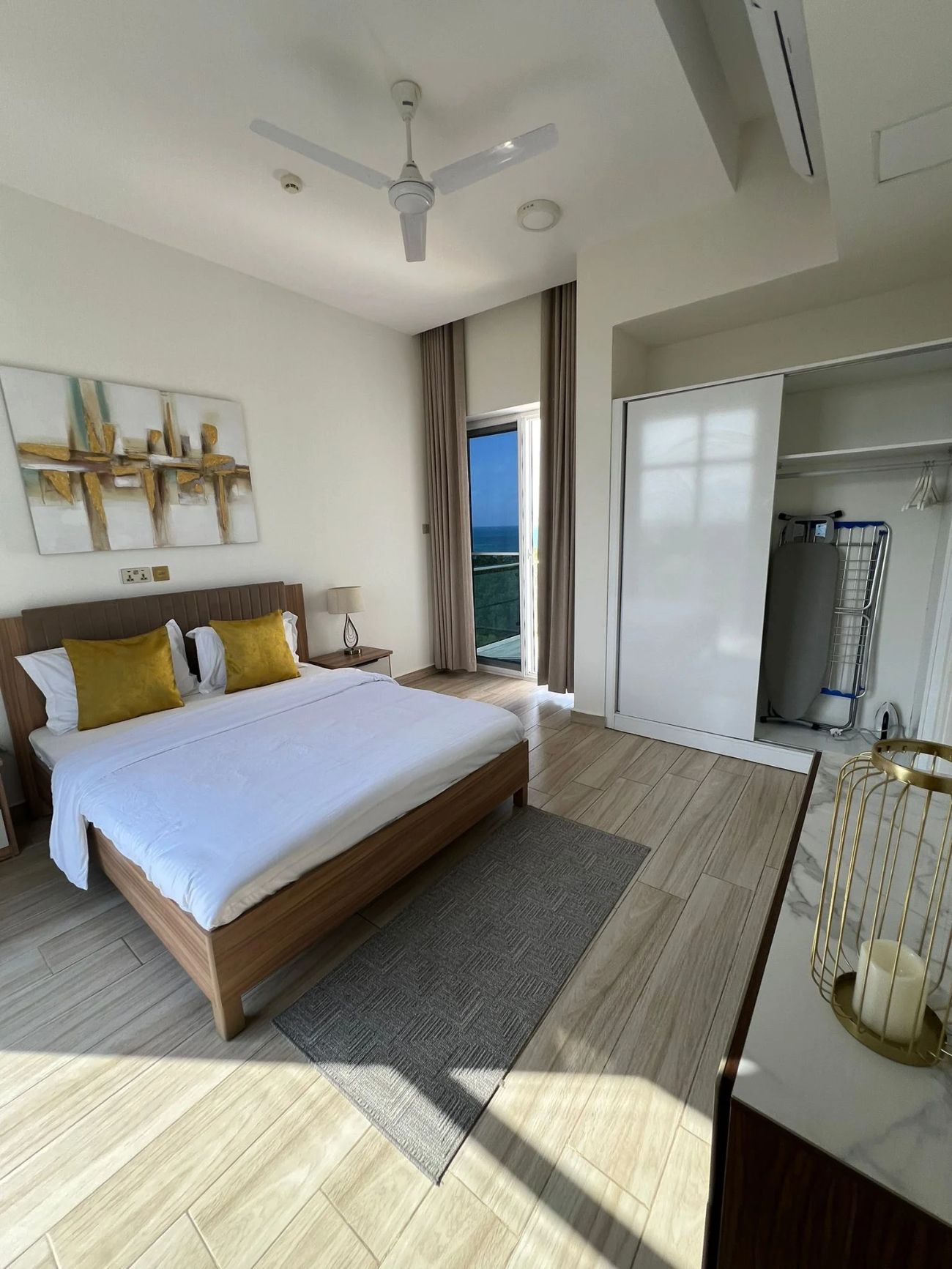 One-Bedroom Apartment — bedroom with queen bed